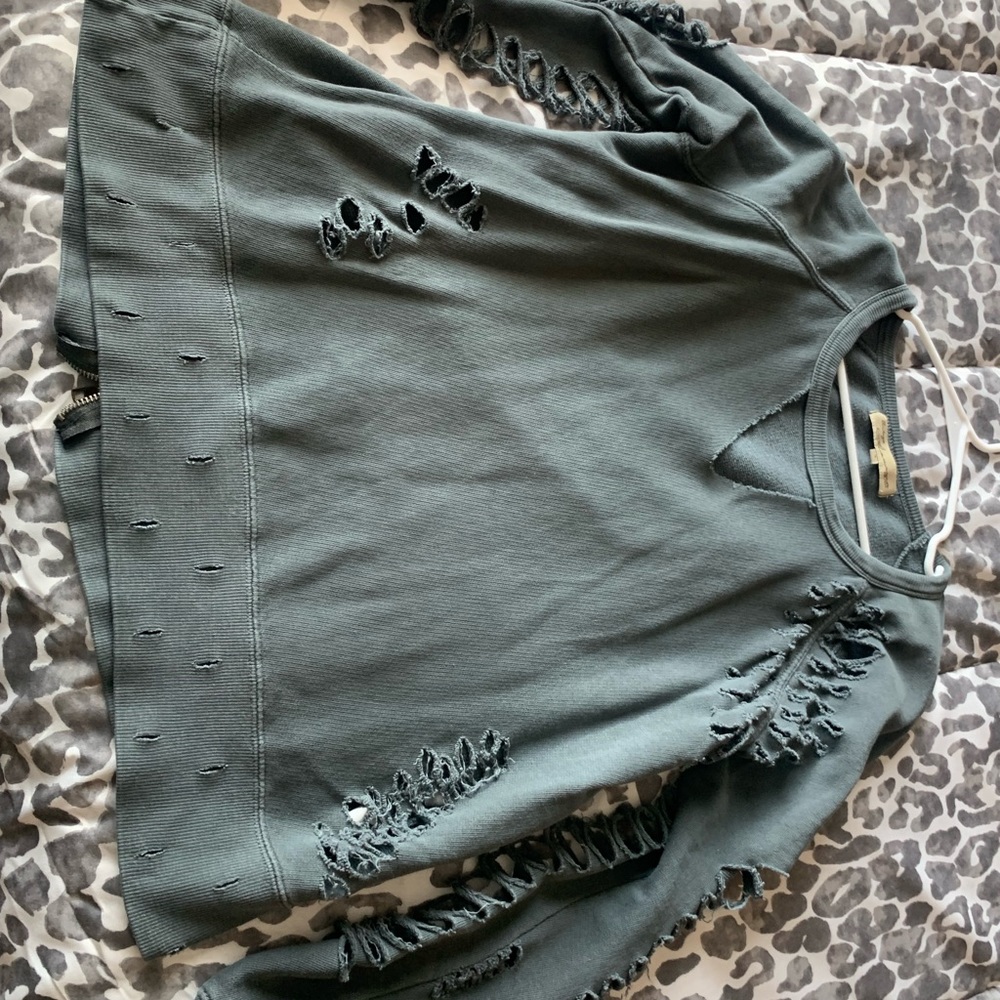 Distressed crew neck sweater